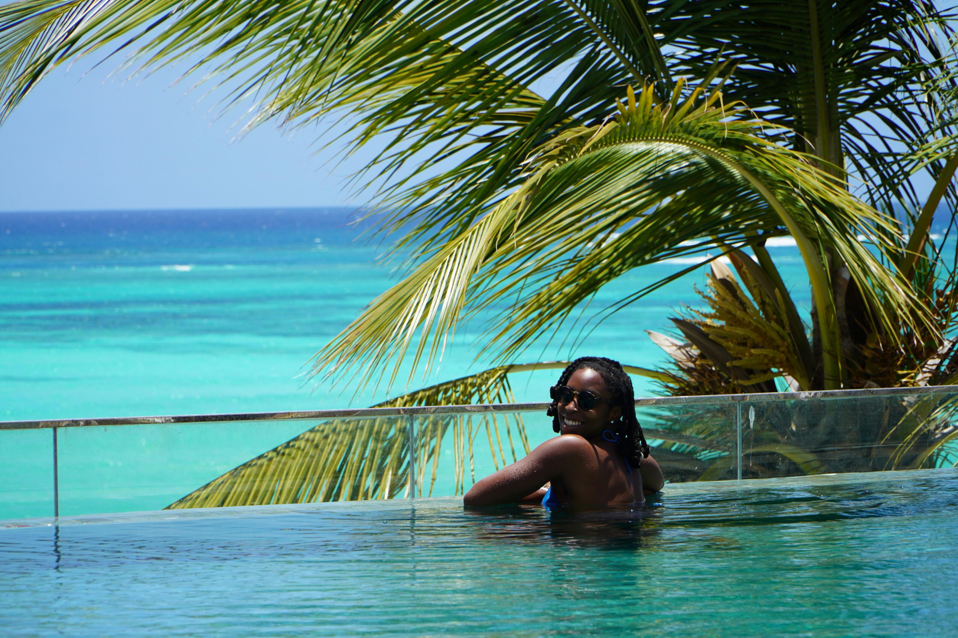 A Woman In An Infinity Rooftop Pool