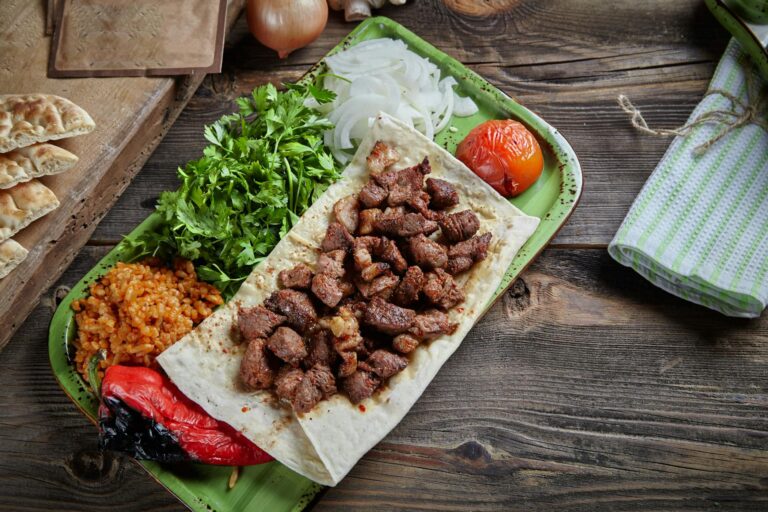 Camel Meat Cubes Seasoned And Served With Flatbread