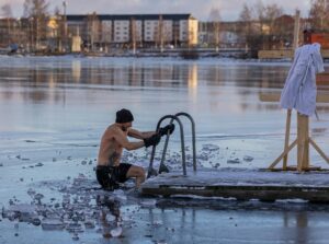 Person Taking A Dip In Icy Cold Lake