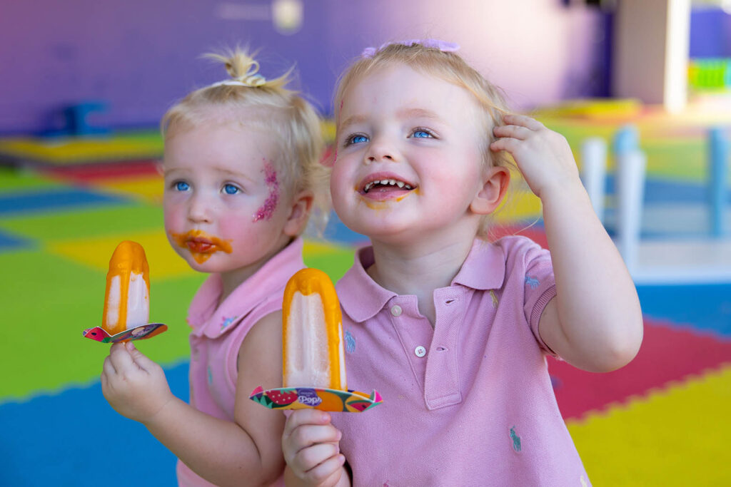 Kids Enjoying Free House Of Pops Ice Lollies During Family Day At DP World Tour Championship
