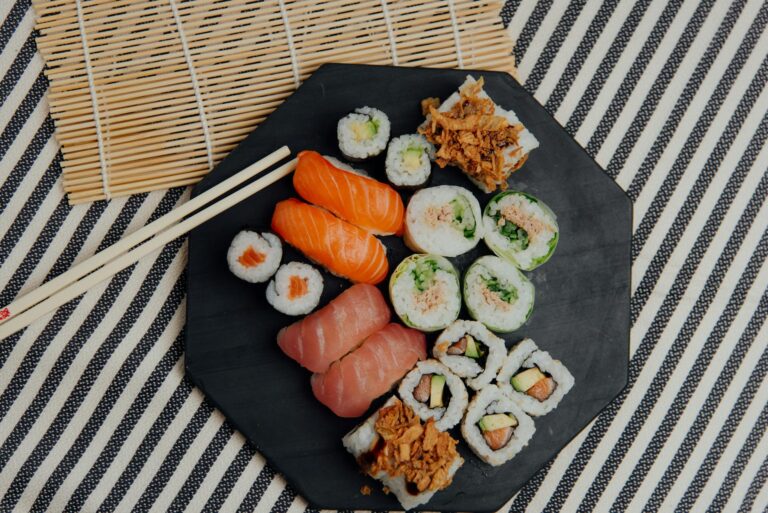 A Sushi Platter With Nigiri, Sashimi, And Rolls Served At A Restaurant In Dubai